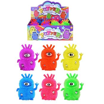 MOSTRI PUFFER LUMINOSI CON 3 OCCHI IN ESPOSITORE (12 pz.)