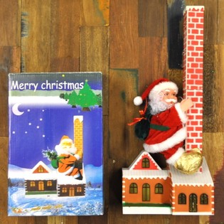 BABBO NATALE SI ARRAMPICA SUL CAMINO (2 pz.)
