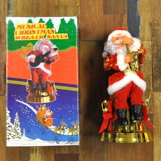 Babbo Natale Animato con Sassofono (2 pz.)