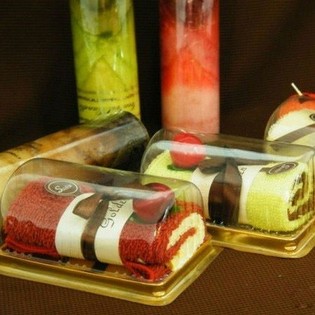 ASCIUGAMANO A FORMA DI TORTA (2 pz.)